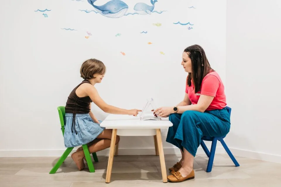 A child doing in person speech therapy