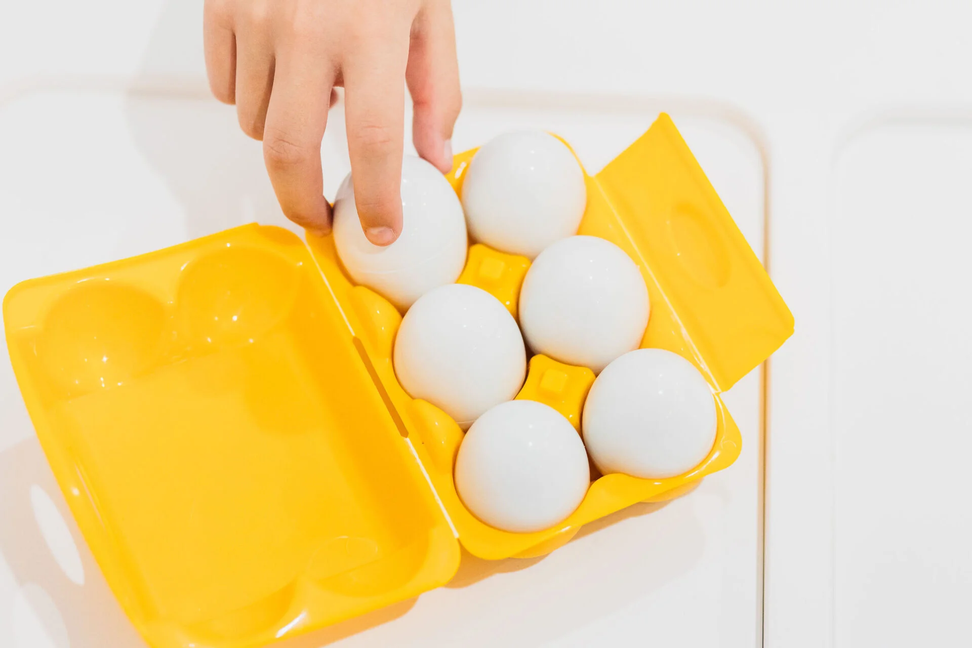 A child practising motor skills with Down Syndrome