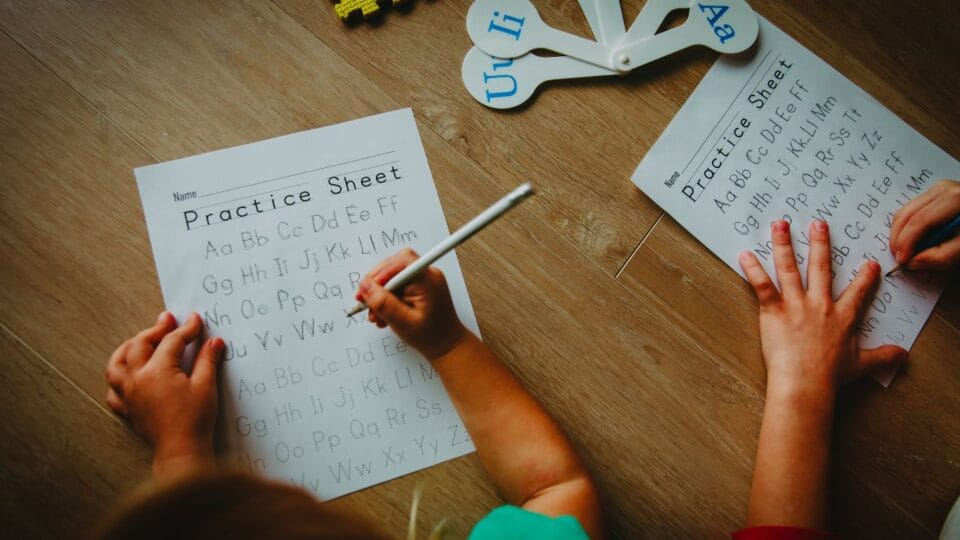 child doing writing practice